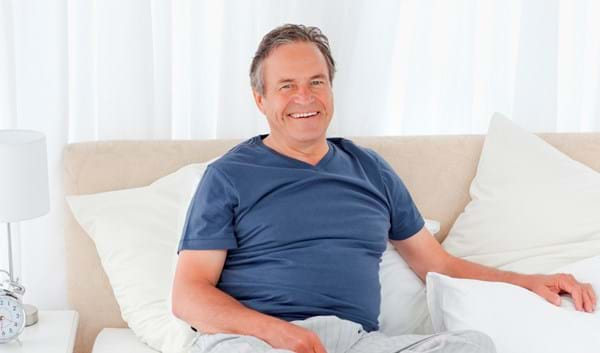 shutterstock_70317742 Happy Man in Bed.jpg